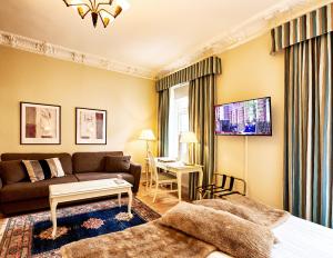 Televisyen dan/atau pusat hiburan di Hotel Royal