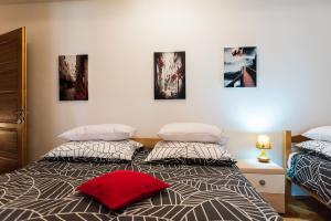 Postel nebo postele na pokoji v ubytování Hana Superior Apartments