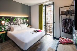 Postel nebo postele na pokoji v ubytování Spice Hotel Milano