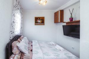 Postel nebo postele na pokoji v ubytování Villa Jadran Apartments