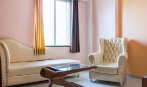 Posezení v ubytování Treebo Naunidh Suites