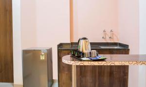 Fotografie z fotogalerie ubytování Treebo Naunidh Suites v destinaci Puné
