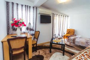 TV a/nebo společenská místnost v ubytování Villa Jadran Apartments