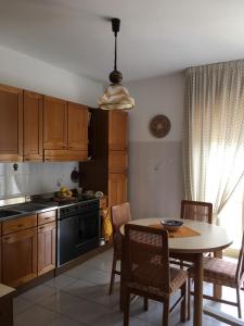 A kitchen or kitchenette at Appartamento Capo d'Orlando