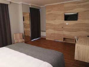 Posteľ alebo postele v izbe v ubytovaní Hospedium Hotel La Marina Costa da Morte