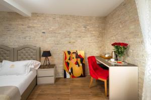 Ένα ή περισσότερα κρεβάτια σε δωμάτιο στο Agava Lux Rooms&Pool