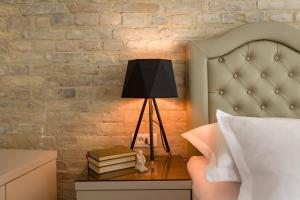 Ένα ή περισσότερα κρεβάτια σε δωμάτιο στο Agava Lux Rooms&Pool