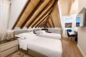 Ένα ή περισσότερα κρεβάτια σε δωμάτιο στο Agava Lux Rooms&Pool