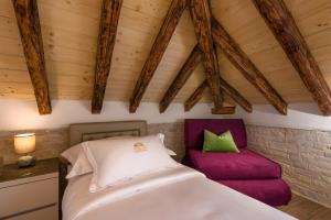 Ένα ή περισσότερα κρεβάτια σε δωμάτιο στο Agava Lux Rooms&Pool