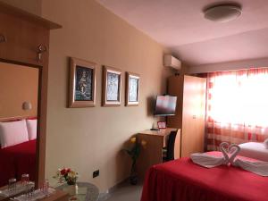 Postel nebo postele na pokoji v ubytování Hotel Nais