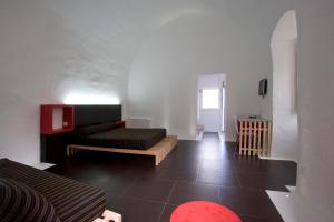 Postelja oz. postelje v sobi nastanitve Basiliani Hotel