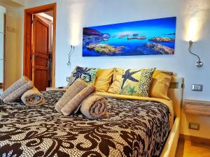 Postel nebo postele na pokoji v ubytování Brezza Marina Guesthouse