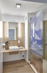 Koupelna v ubytování Hotel Strandidyll