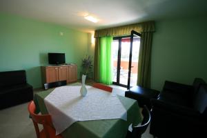 TV a/nebo společenská místnost v ubytování Villa Egida Capris