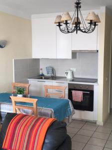 Køkken eller tekøkken på Apartamentos Rocas del Mar
