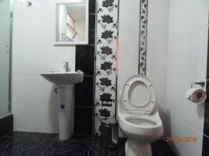 Ванная комната в B&B Cusing Wasi
