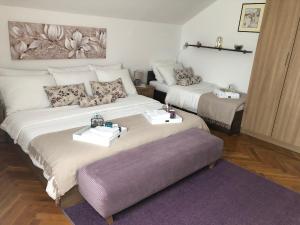 Postel nebo postele na pokoji v ubytování Apartment Satori