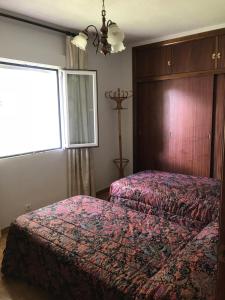 Un pat sau paturi într-o cameră la Guadamolinos Naturaleza