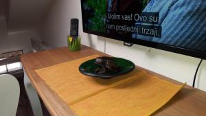 TV a/nebo společenská místnost v ubytování LukaDora