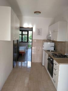 Kuchyň nebo kuchyňský kout v ubytování Apartman Frketić