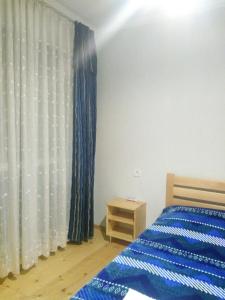 Кровать или кровати в номере guest house katia tbilisi