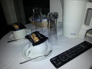 Příslušenství pro přípravu čaje a kávy v ubytování Tree Hotel at Iffley