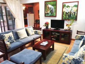 TV a/nebo společenská místnost v ubytování Casa Carolina Gran Pacífica Resort