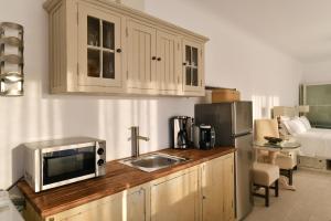 Kuchyň nebo kuchyňský kout v ubytování Paros Butterfly Villas