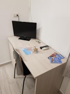 TV a/nebo společenská místnost v ubytování B&b ONE