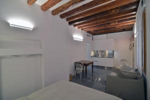 Postel nebo postele na pokoji v ubytování Carbonaia Venezia