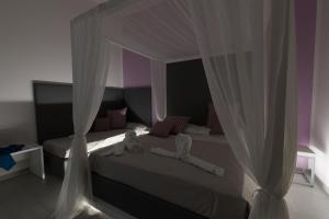 Postel nebo postele na pokoji v ubytování B&B MARSALA