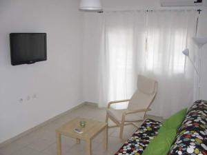 TV a/nebo společenská místnost v ubytování Apartmani Vukmanovic