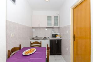 Кухня или мини-кухня в Apartments Joze
