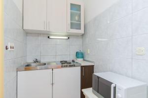 Кухня или мини-кухня в Apartments Joze
