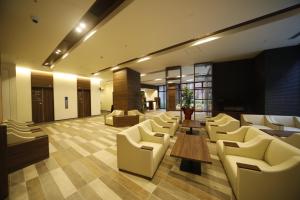 Posezení v ubytování Dormy Inn Oita