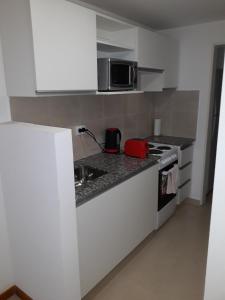 Kitchen o kitchenette sa Bajada Sargento Cabral