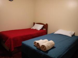 A bed or beds in a room at Casa Marite