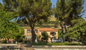 A garden outside Elaia Hotel