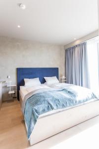 Postel nebo postele na pokoji v ubytování monte mare SAUNA-SPA-SPORTS-HOTEL