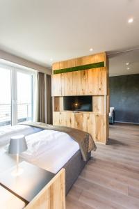 Postel nebo postele na pokoji v ubytování monte mare SAUNA-SPA-SPORTS-HOTEL