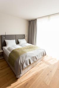 Postel nebo postele na pokoji v ubytování monte mare SAUNA-SPA-SPORTS-HOTEL