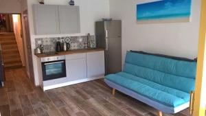 Kjøkken eller kjøkkenkrok på Le Nautilus - 2 adultes 3 enfants - Canet Plage - Vue Mer - Place Mediterranée
