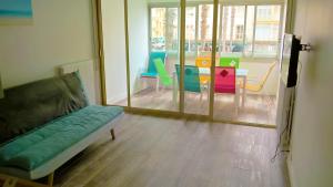 Et sittehjørne på Le Nautilus - 2 adultes 3 enfants - Canet Plage - Vue Mer - Place Mediterranée