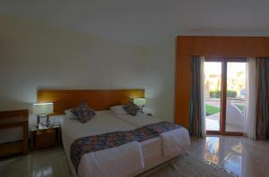 Postel nebo postele na pokoji v ubytování Swiss Inn Resort Dahab