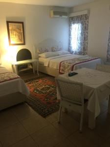Postel nebo postele na pokoji v ubytování Pasha Motel