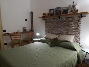 Posteľ alebo postele v izbe v ubytovaní B&B Al Ponte