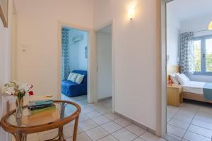 A bed or beds in a room at Argo Pension