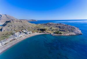 an aerial view of a small island in the ocean at Haraki Aqua Blue in Haraki