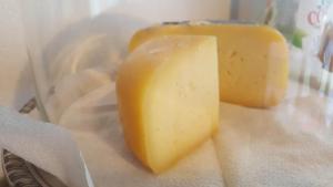 a stick of cheese sitting on top of a napkin at Residencia Mateus in Faja Grande