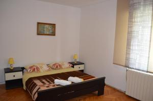 Postel nebo postele na pokoji v ubytování Apartments Antonio